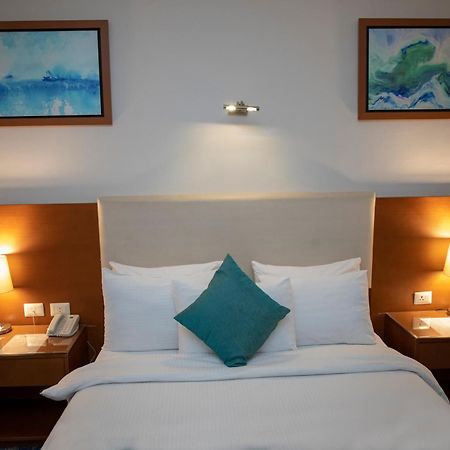 Rehana Plaza Hotel Каир Экстерьер фото A bedroom at the hotel
